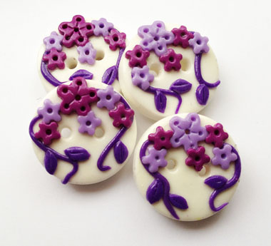 Purple flowers - set of 4 polymer clay buttons